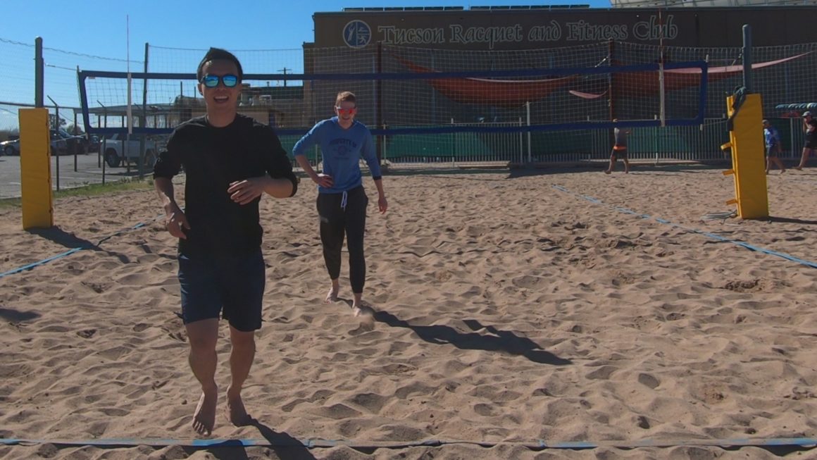 Having a little laugh after playing beach volleyball