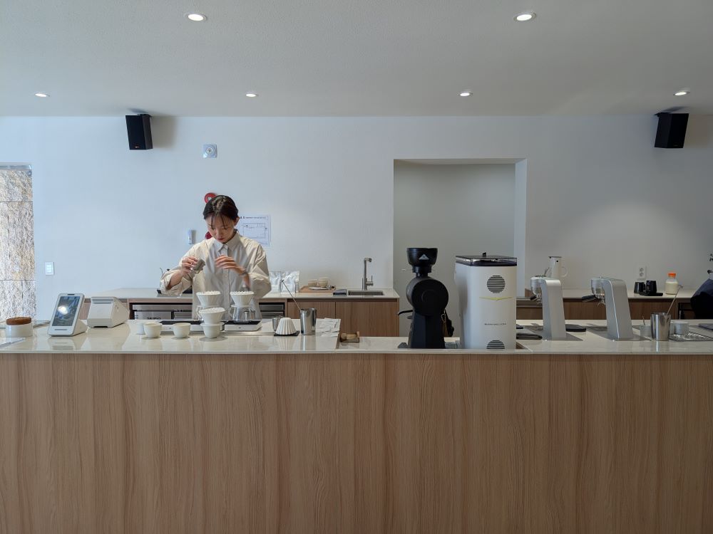 One of the baristas making our coffee!