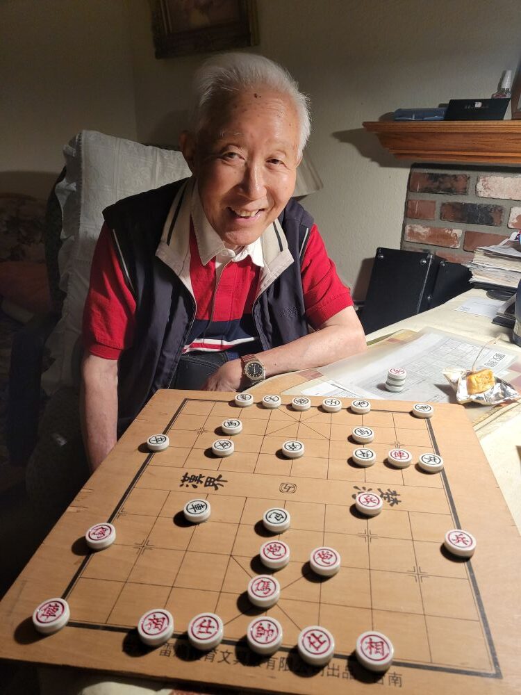 my grandpa and I playing Chinese chess